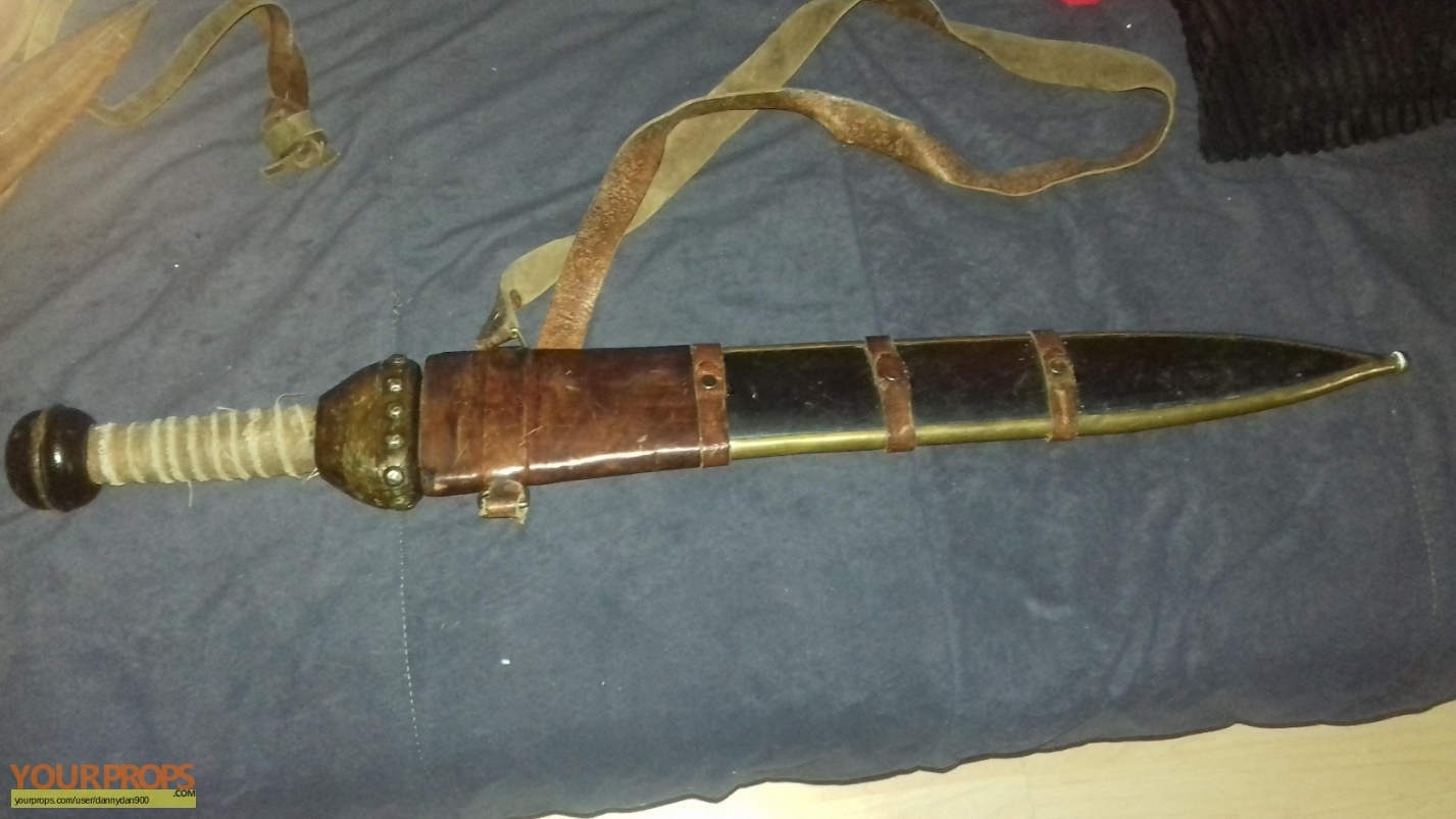 https://www.yourprops.com/movieprops/original/yp593292ed73c112.33792135/King-Arthur-Hero-Roman-soldier-sword-scabbard-1.jpg